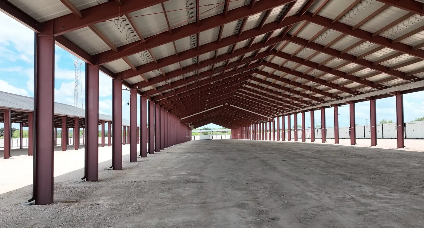 Covered RV and boat parking stalls under steel canopy in Von Ormy, TX